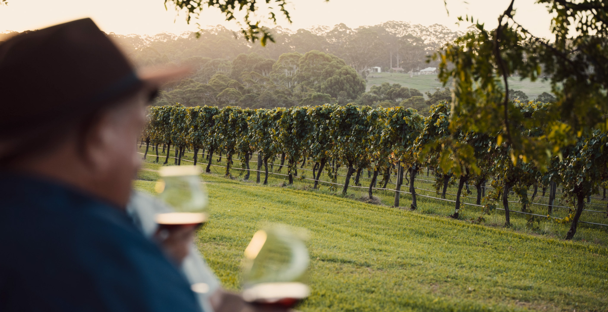 A guest eating with a view over the vineyard at Easter in the Great Southern