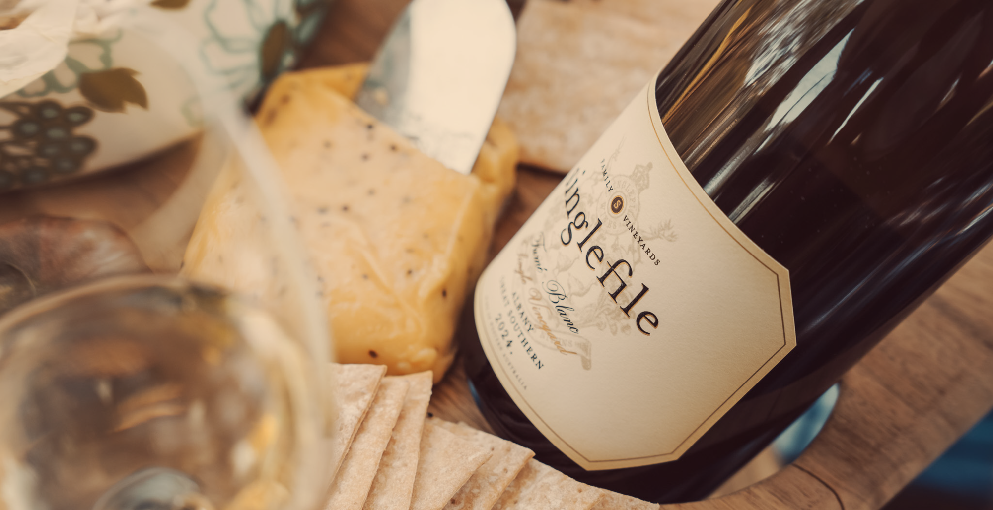 Close up of Fumé Blanc with cheese and crackers