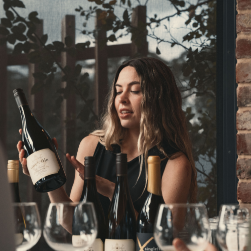 Woman explaining the properties of a wine